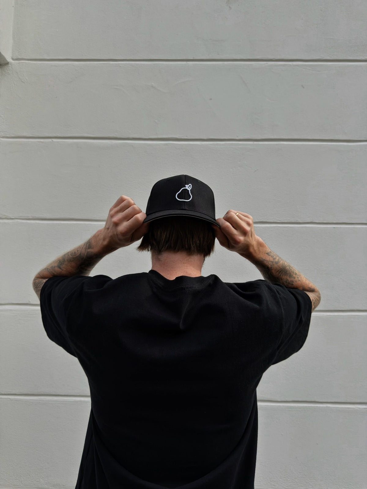 The Snapback 2.0 - Pear logo